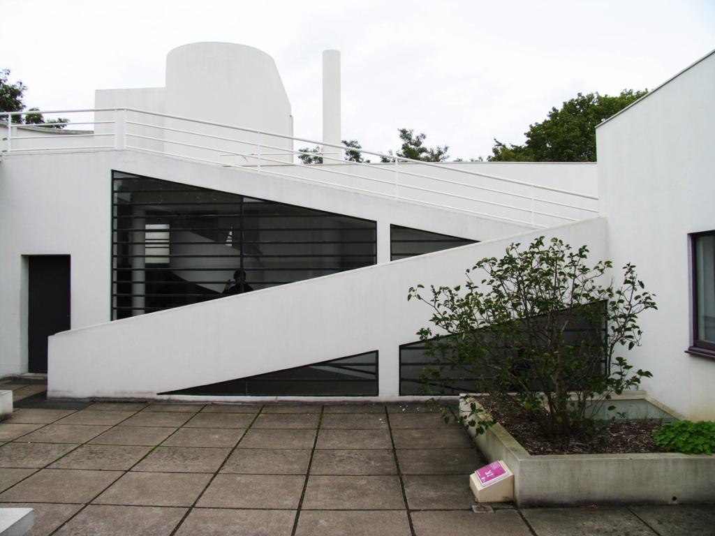 The roof of Villa Savoye, a sloping ramp running alongside a glazed wall