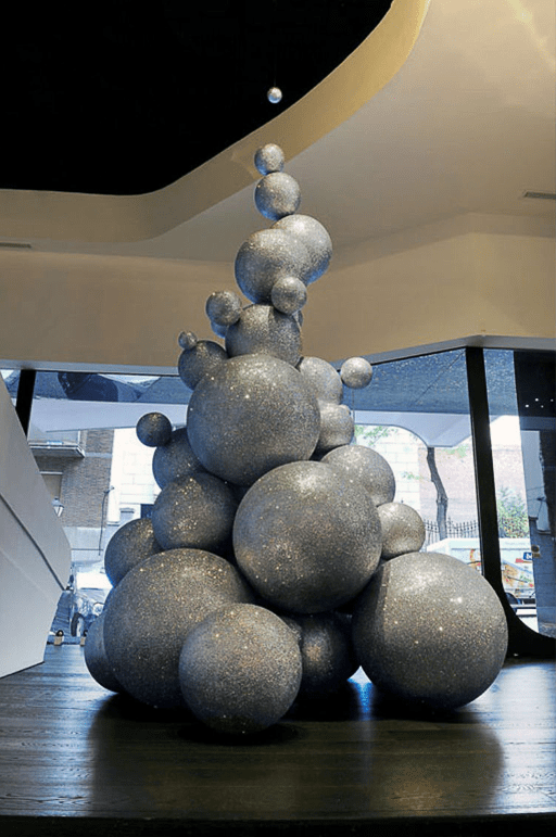 Álvaro Álvarez's composition of large silver balls in the form of a Christmas tree in Madrid