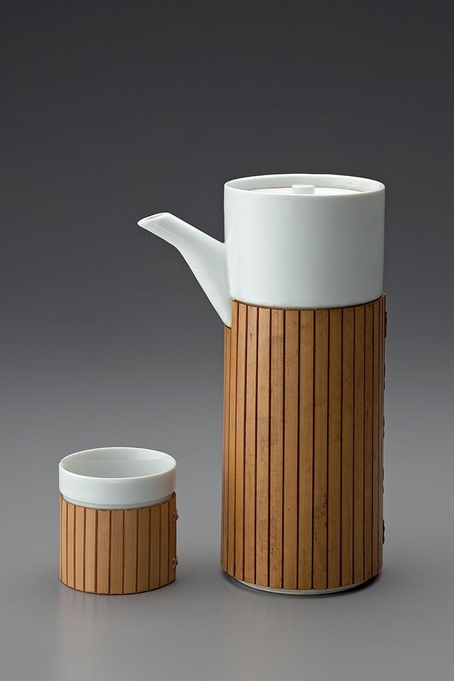 Porcelain coffee pot with bamboo wrapping and a cup, designed by Masahiro Mori