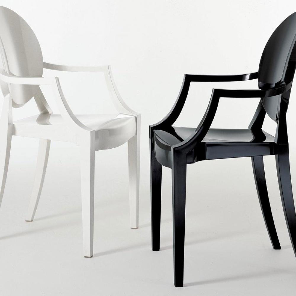 Starck's Louis Ghost chairs in white and black versions side by side