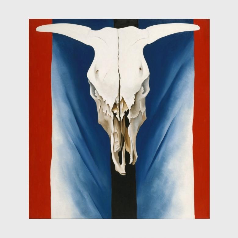 O'Keeffe painting: a cow skull against a red, white and blue background