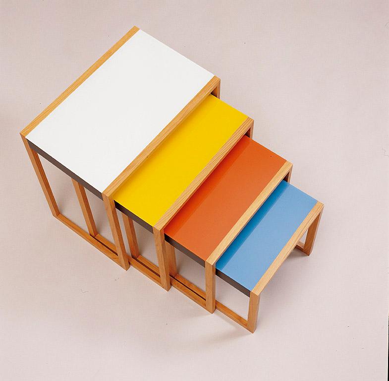 Top view of the Albers nesting tables with the coloured tops pulled out in a stepped arrangement
