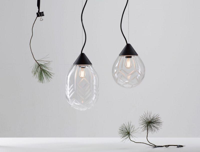 Two glass teardrop pendant lights with a faceted pattern, designed by Katerina Kopytina