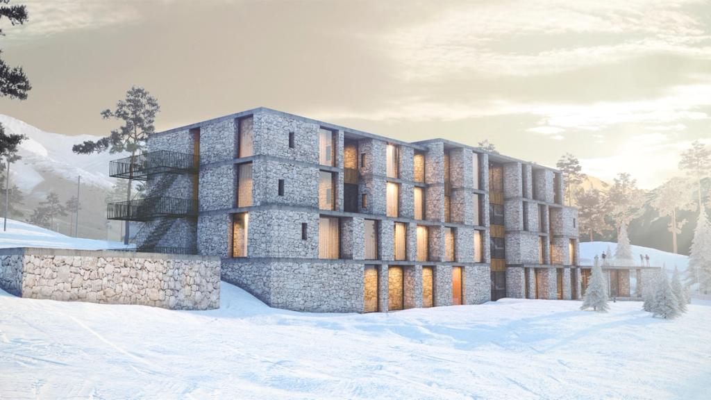A four-storey building with a gabion-and-stone facade on a snow-covered mountain slope, visualisation