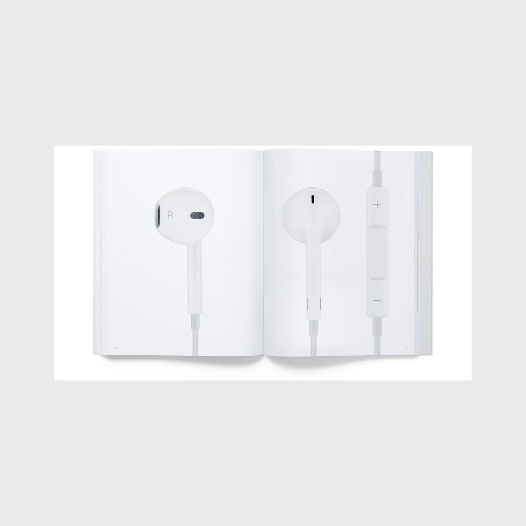 A spread featuring a close-up of white Apple EarPods and their remote