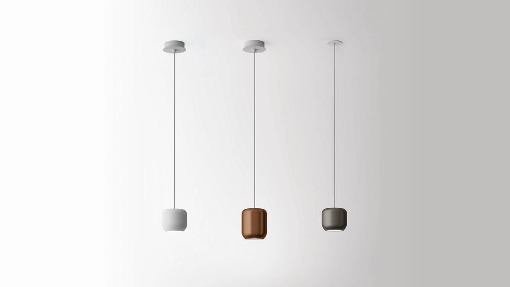 Three teardrop pendant lights in white, copper and graphite, designed by Dima Loginov