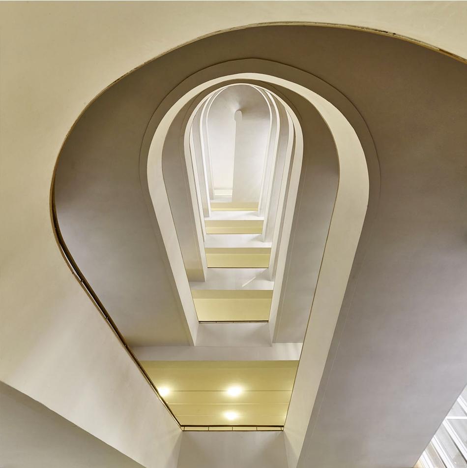 Interior of the Tsentrosoyuz, view from below of the ramp's coils through a glazed opening