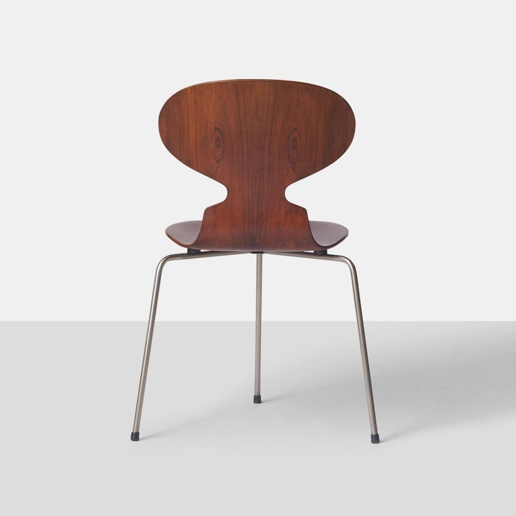 Arne Jacobsen's Ant chair, with a bent-wood seat in the shape of an ant on three steel legs