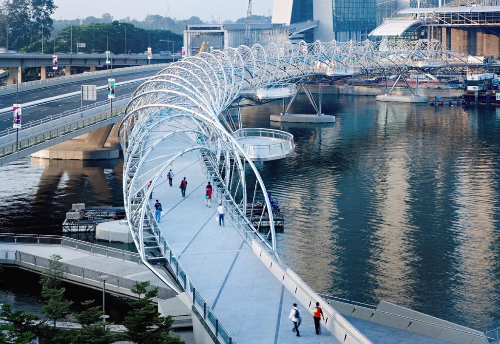 The Helix pedestrian bridge along the Marina Bay waterfront in Singapore, with people walking across it
