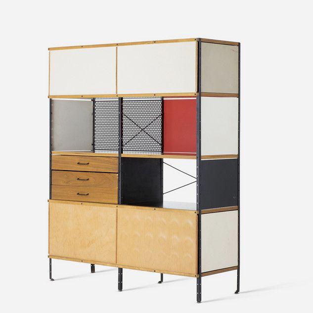 Charles and Ray Eames' ESU modular shelving unit with coloured panels, drawers and hinged doors