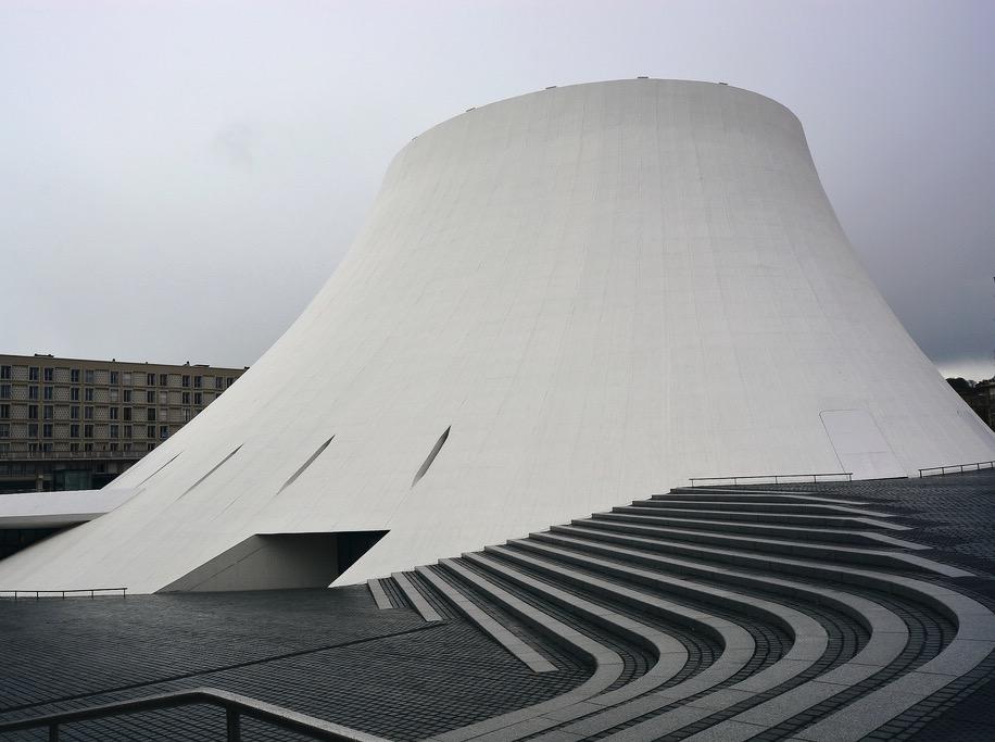 The white volcano-shaped Le Volcan building in Le Havre, with a fan-shaped staircase