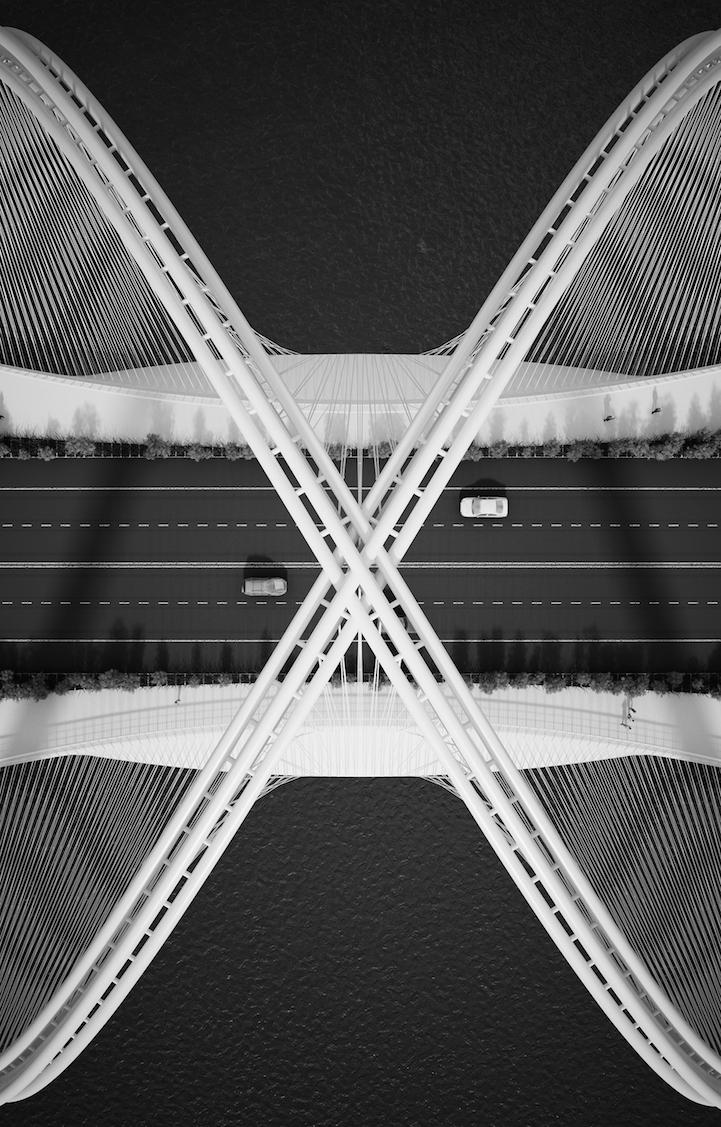 Black-and-white photograph of San Shan Bridge: crossing X-shaped arches over a highway