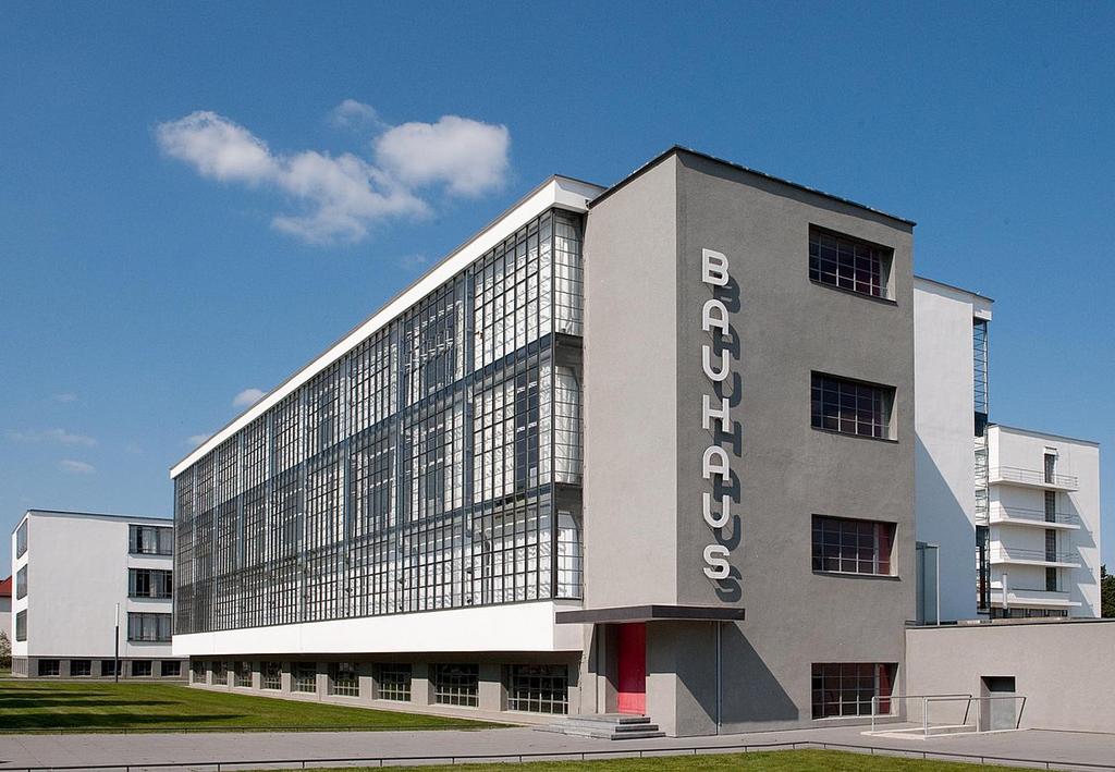 The Bauhaus building in Dessau with the glazed workshop façade and the vertical BAUHAUS inscription
