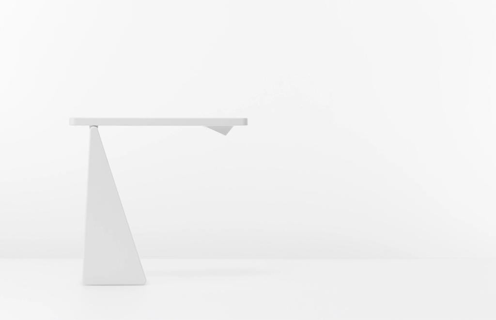 A white writing desk with a triangular base, designed by Kazushige Miyake