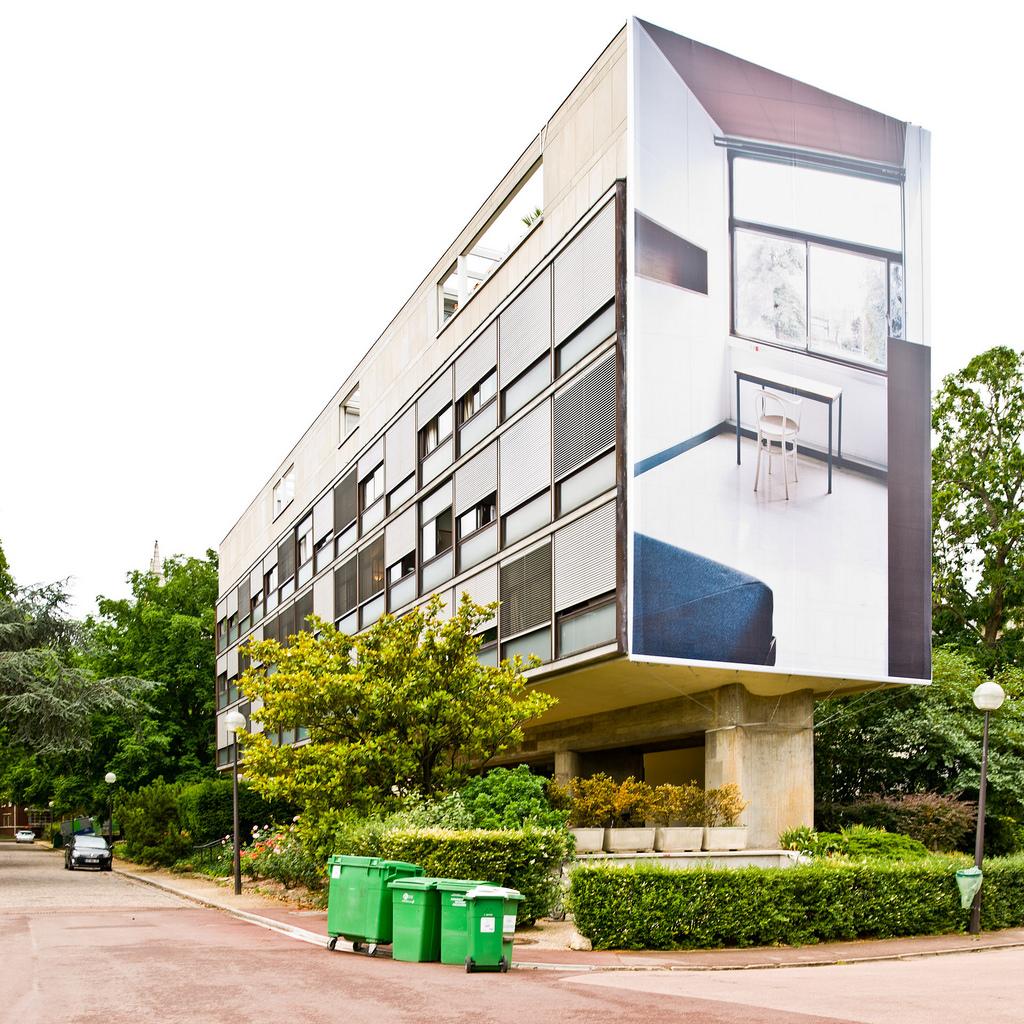 The Brazil House in Paris, the end wall featuring a large photographic print of an interior
