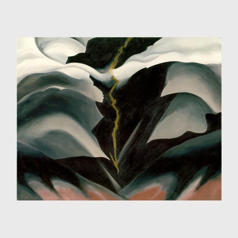 O'Keeffe painting Black Place: black-grey hills with a yellow ravine