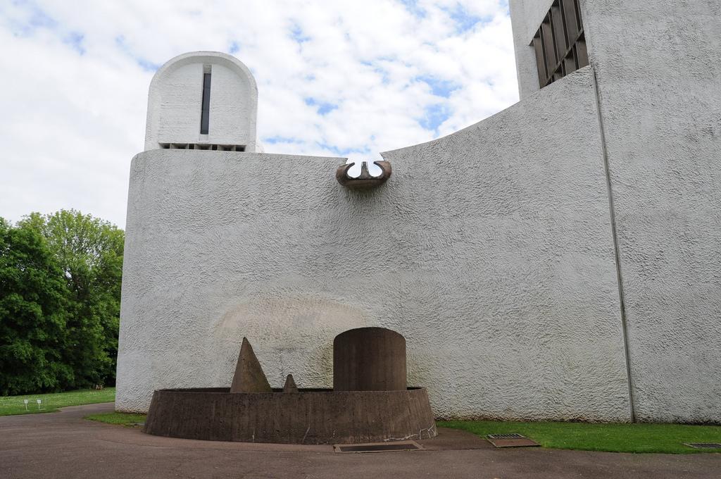 The Chapel of Ronchamp, a drainage gargoyle above a concrete basin for rainwater