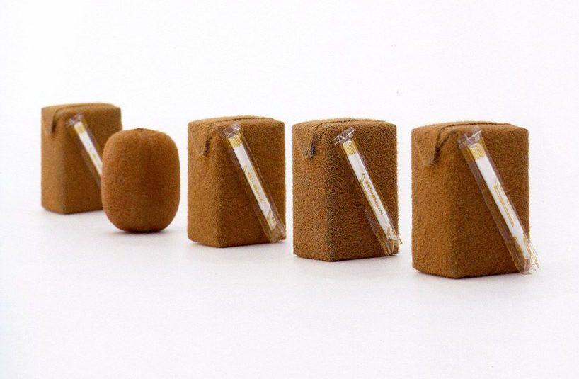 Juice Skin concept: juice cartons in a brown kiwi-peel texture with straws