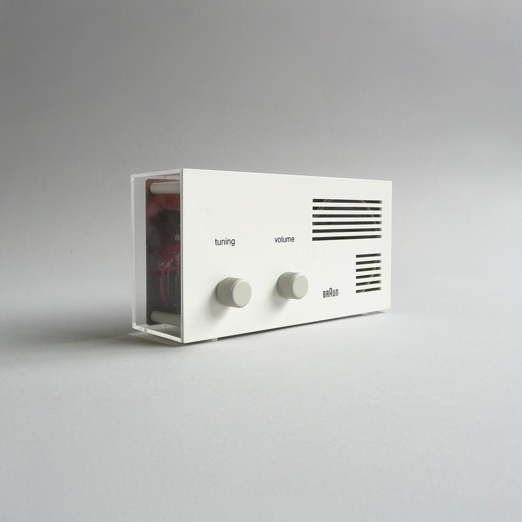 Three Braun pocket radios in red, yellow and blue with ventilation slots