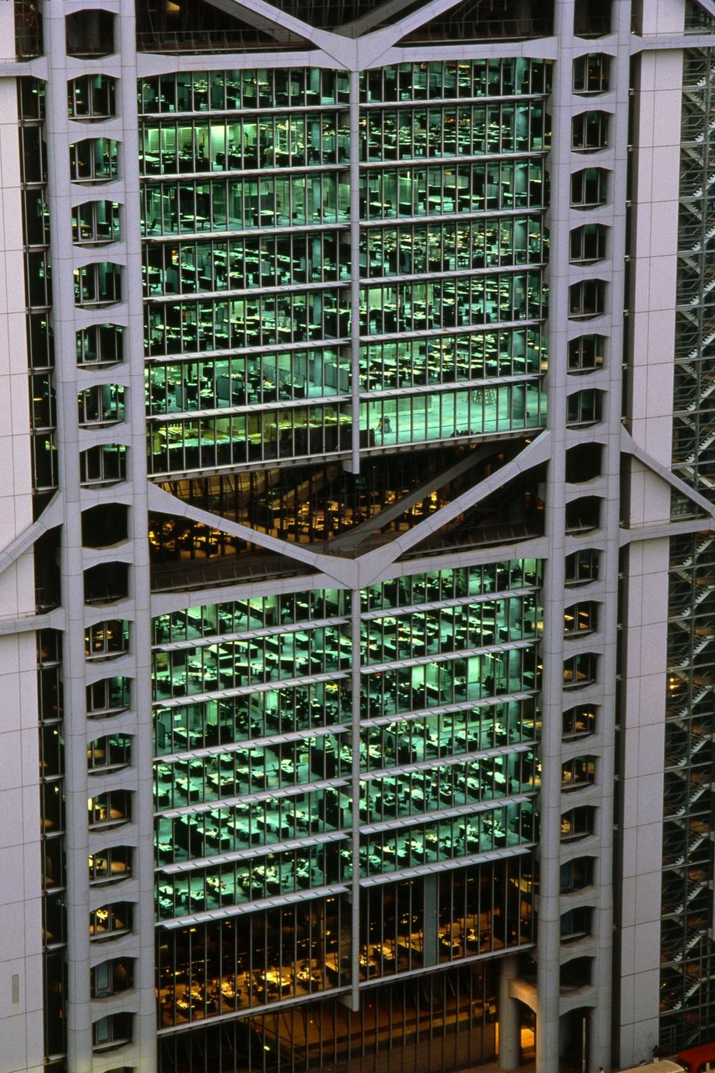 Close-up of the HSBC bank's glass façade with exposed diagonal steel trusses