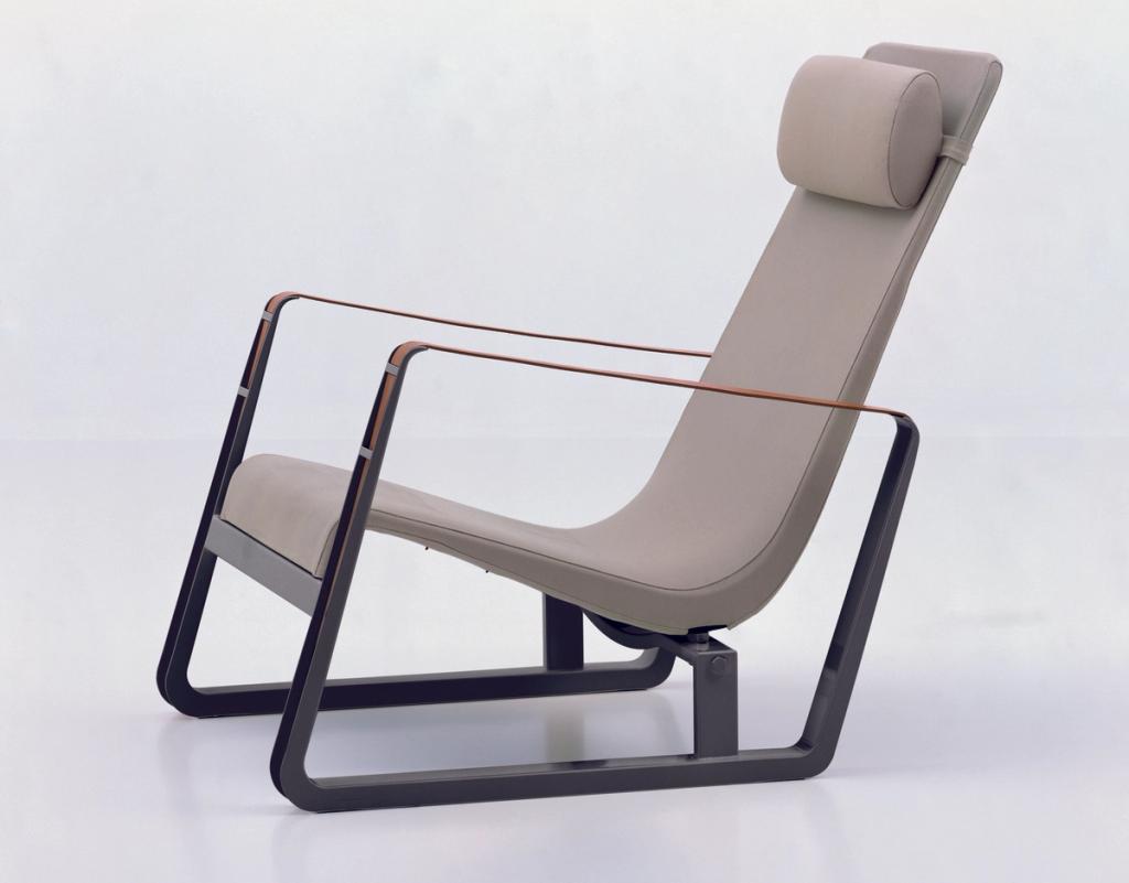 Jean Prouvé's Cité armchair with grey leather upholstery and leather strap armrests
