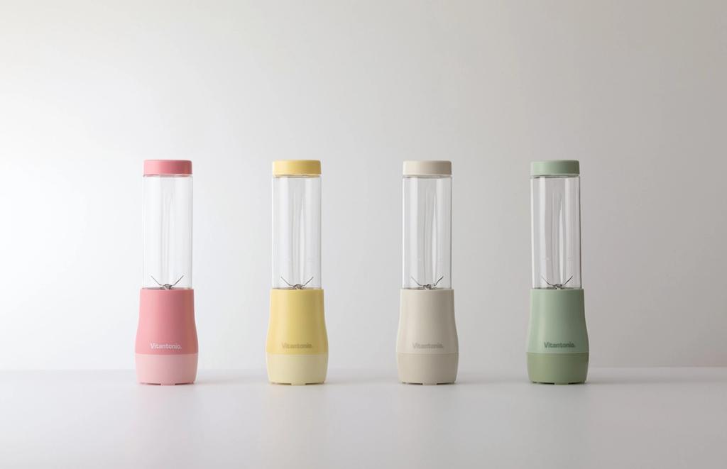 Four Vitantonio blenders with pastel lids: pink, yellow, beige and green