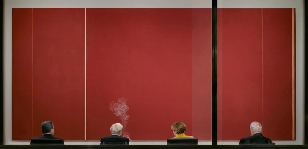 Viewers before a vast red abstract painting in a gallery, wisps of smoke rising above them