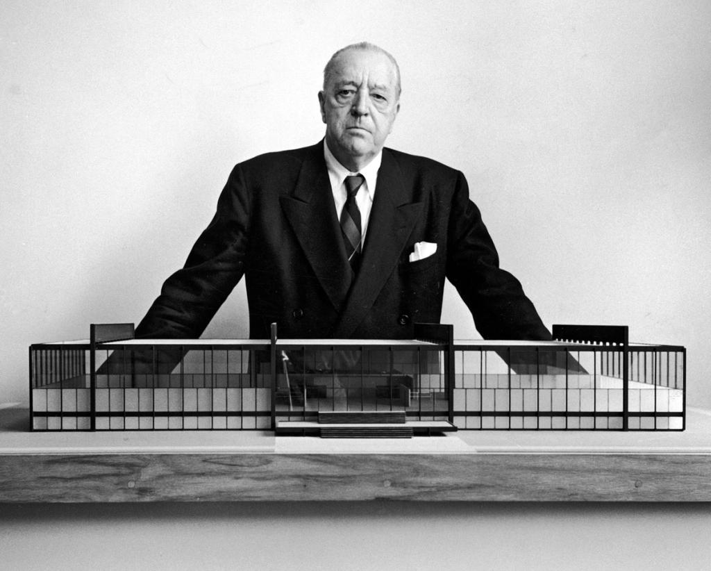 Portrait of Mies with a model of the Illinois Institute of Technology