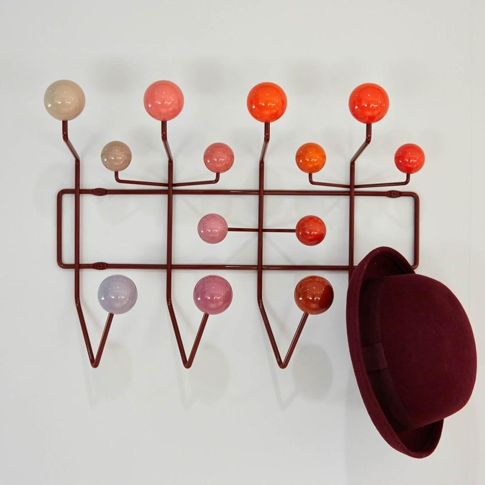 Charles and Ray Eames' Hang It All coat rack with multicoloured wooden balls and a hat