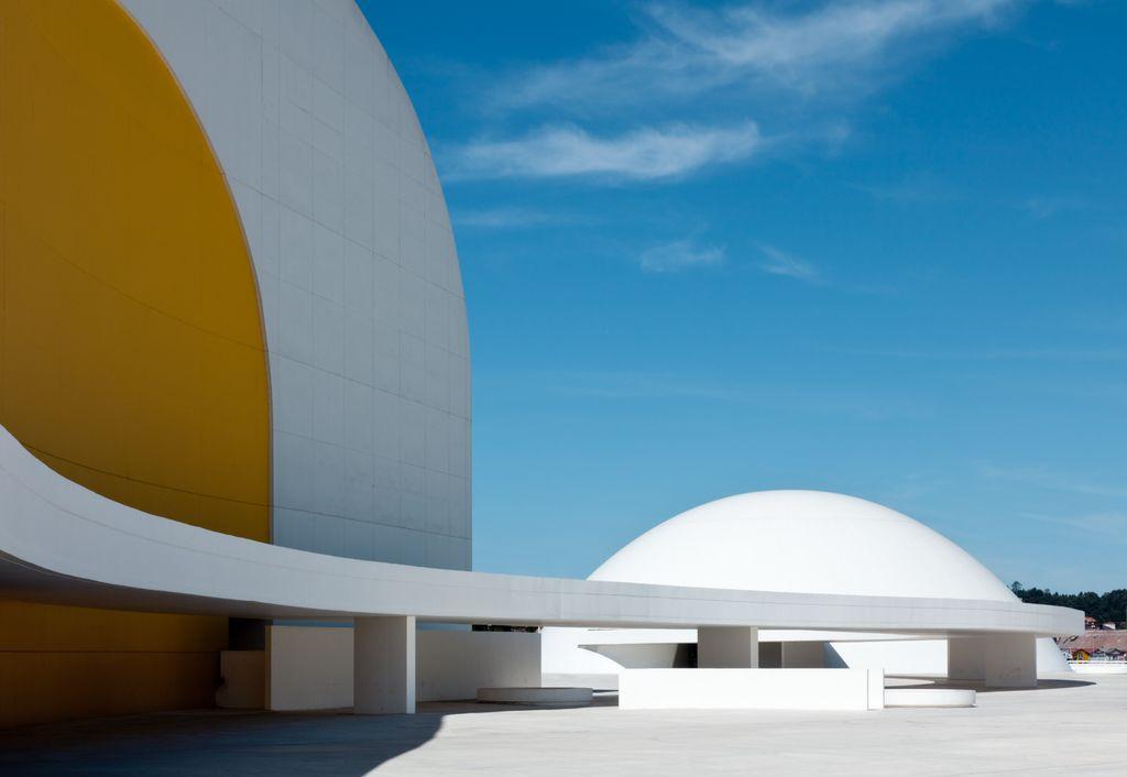 The white dome and yellow auditorium wall of the cultural centre in Avilés