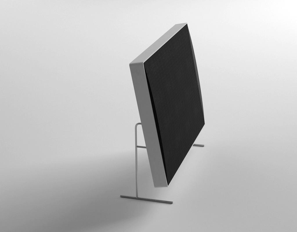 A pair of Braun LE1 round electrostatic speakers with a metal mesh surface