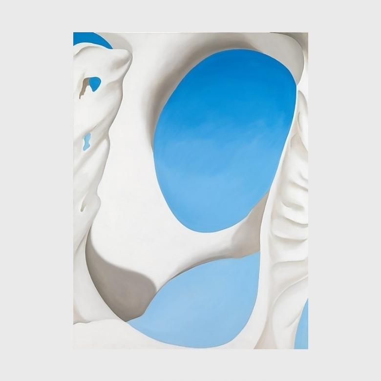 O'Keeffe painting from the Pelvis series: a white bone with openings of blue sky
