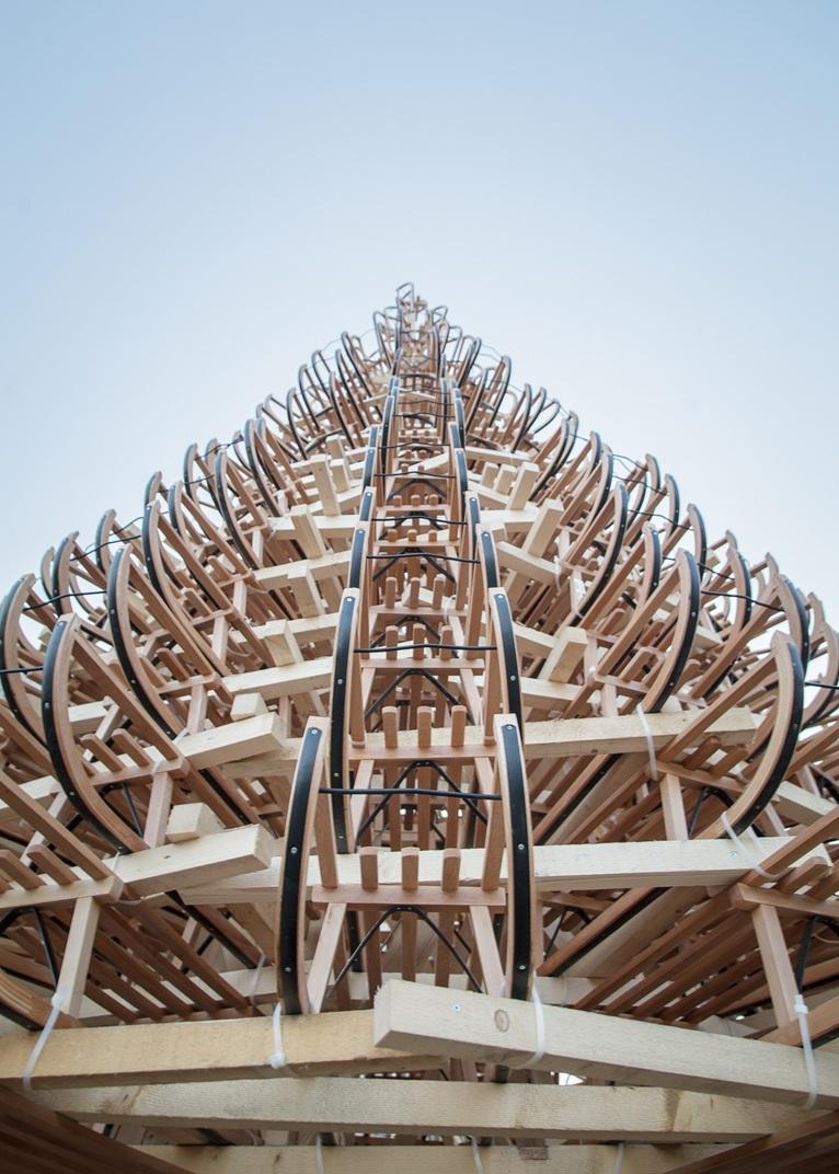 The sledge structure tapering towards its apex against an open sky