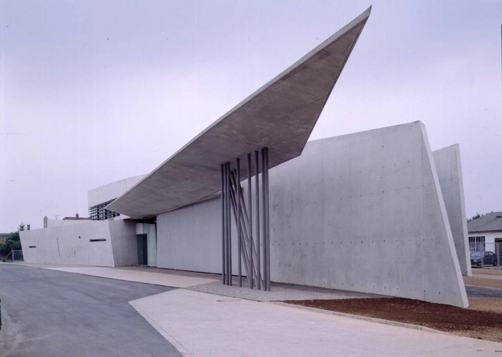 The Vitra fire station in concrete, with a sharp cantilevered concrete canopy