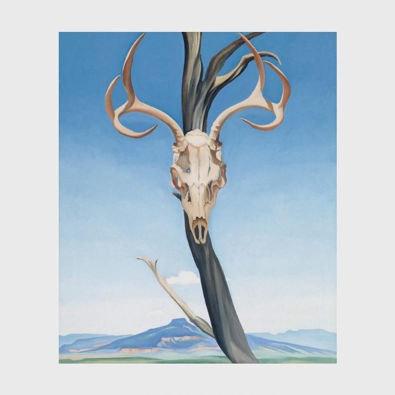 O'Keeffe painting: a deer skull with antlers against a bare trunk and blue sky