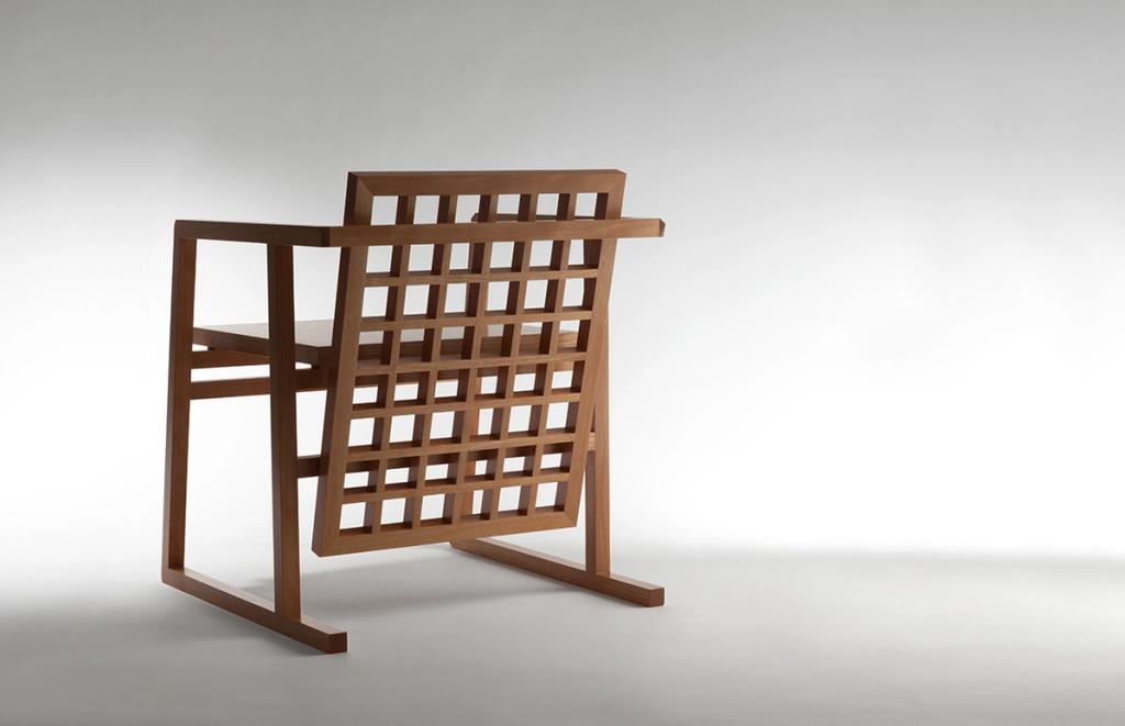 Wooden armchair with a lattice back and armrests