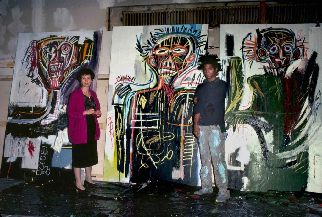 Basquiat and Annina Nosei in Jean-Michel's basement studio