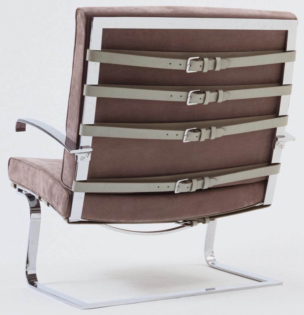 Tugendhat chair from the rear, showing leather straps on the spring back and chrome frame
