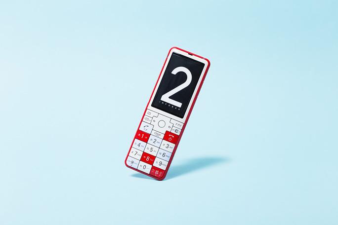 Infobar phone showing the number 2 on screen against a blue background