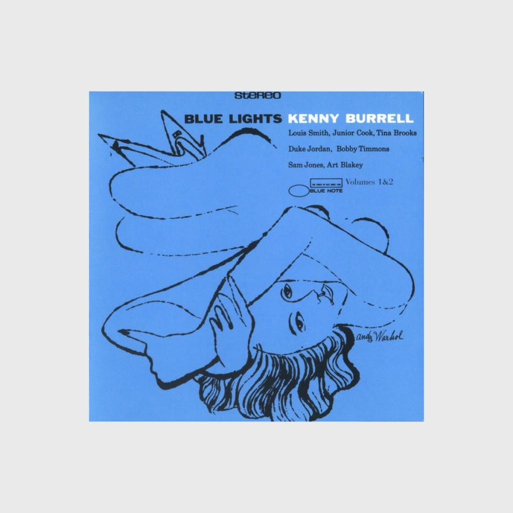 The blue cover of Kenny Burrell's jazz album Blue Lights featuring a contour drawing of a face