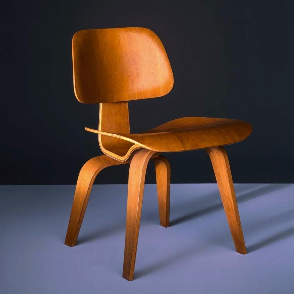 The Eameses' bent plywood chair with separate back and seat on wooden legs