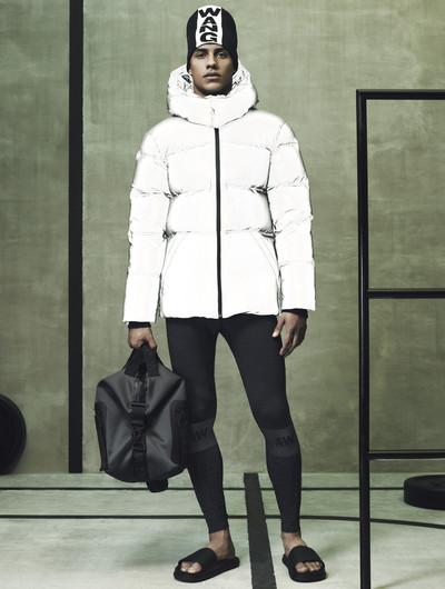 Alexander Wang x H&M men's look: white puffer jacket and hat with the WANG logo
