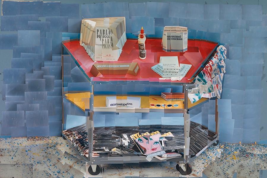 A Hockney still-life collage featuring an artist's trolley and a book on Picasso