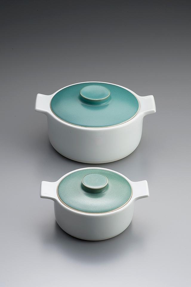 Two white pots with turquoise lids and side handles