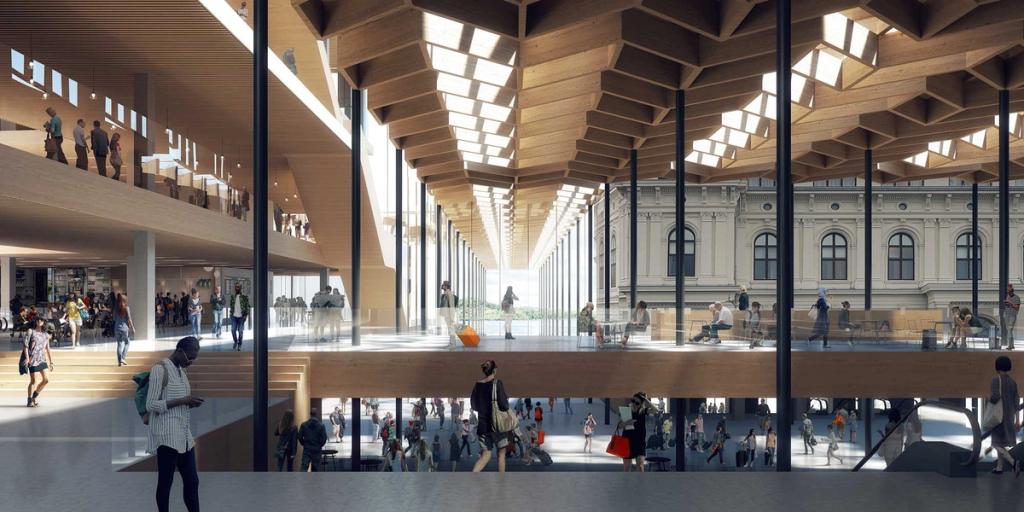 Interior render of Nordisk Lys featuring a wooden ceiling and a historic façade alongside, with visitors inside
