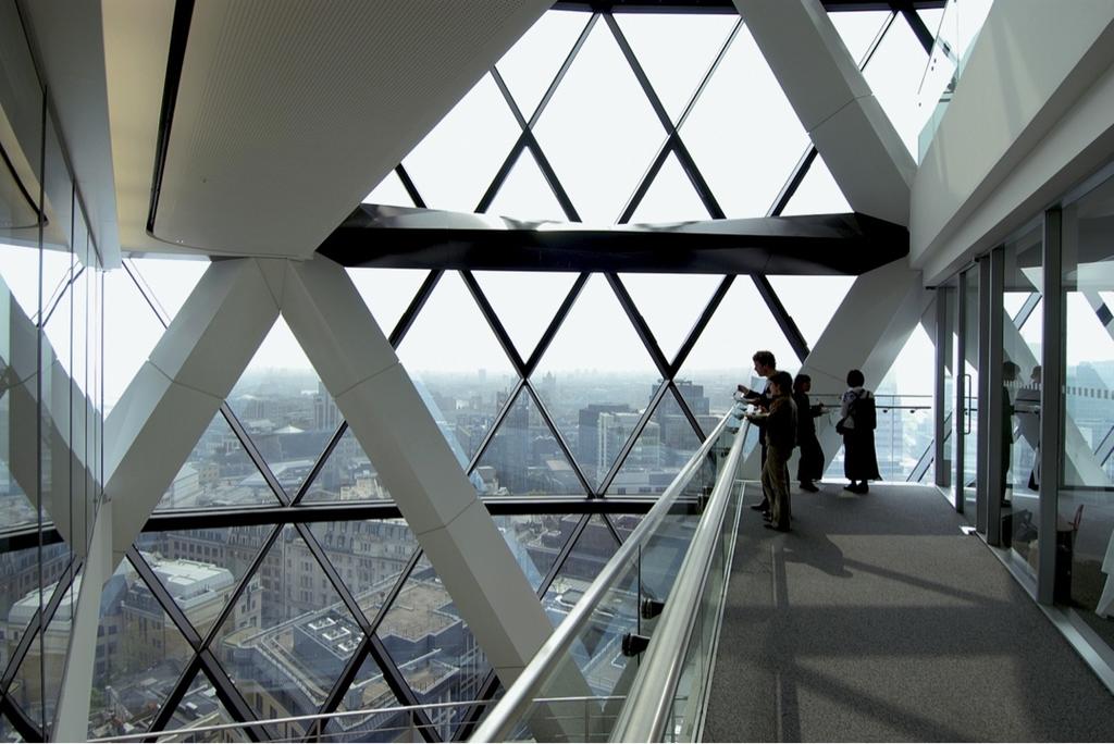 The interior viewing gallery of 30 St Mary Axe, with its diamond glazing and views across London