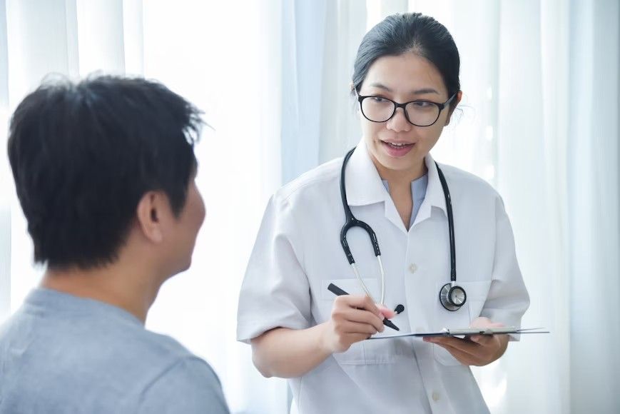 Doctor consulting a patient during medical visit
