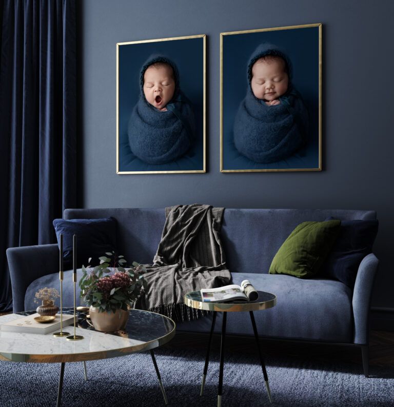 Newborn wall art above a sofa