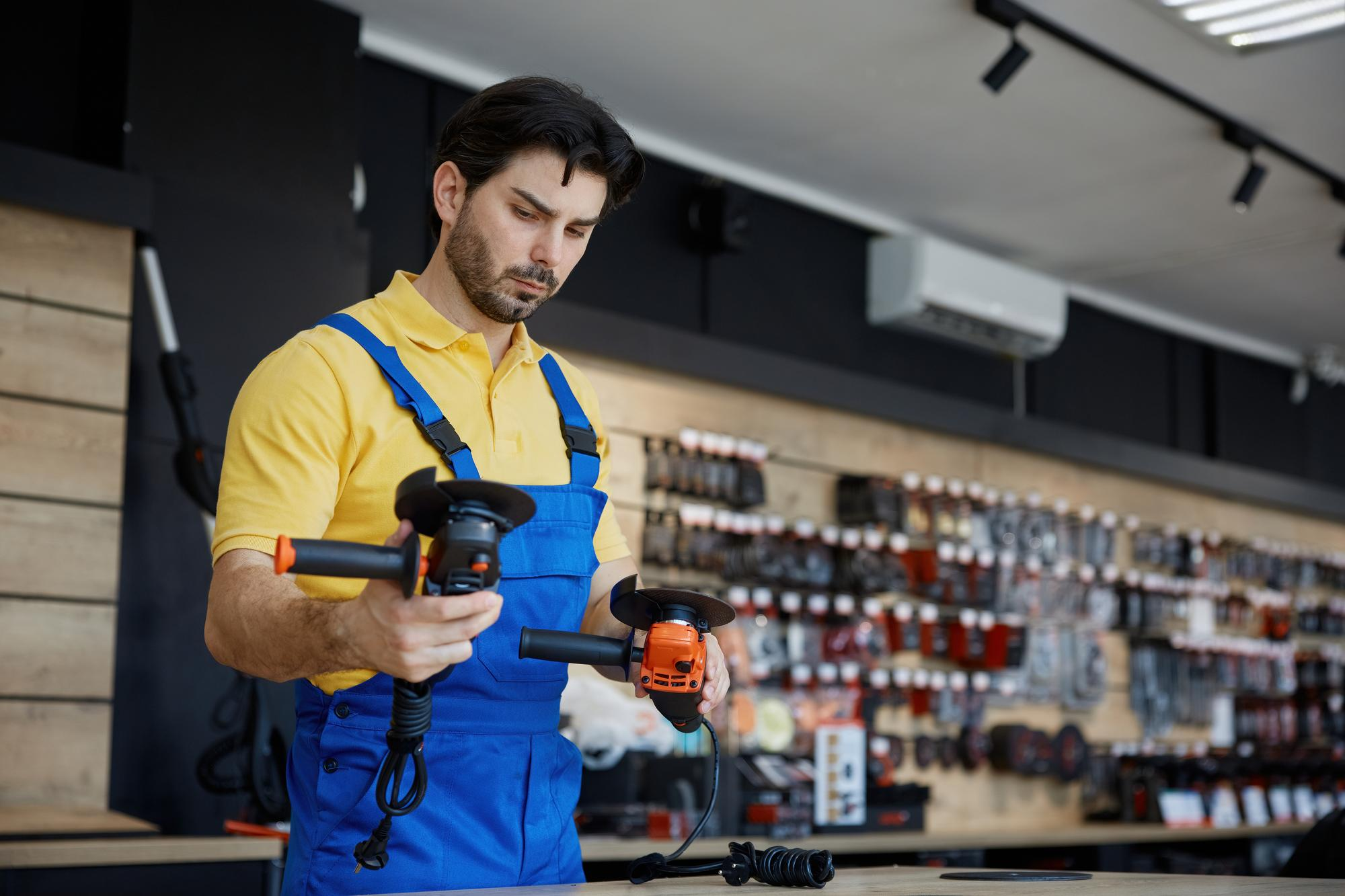 Worker using grinder