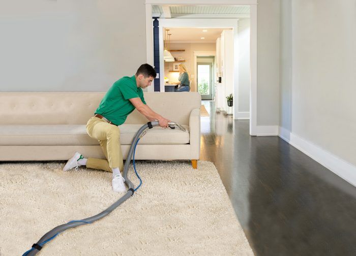 chem-dry tech performing a upholstery cleaning